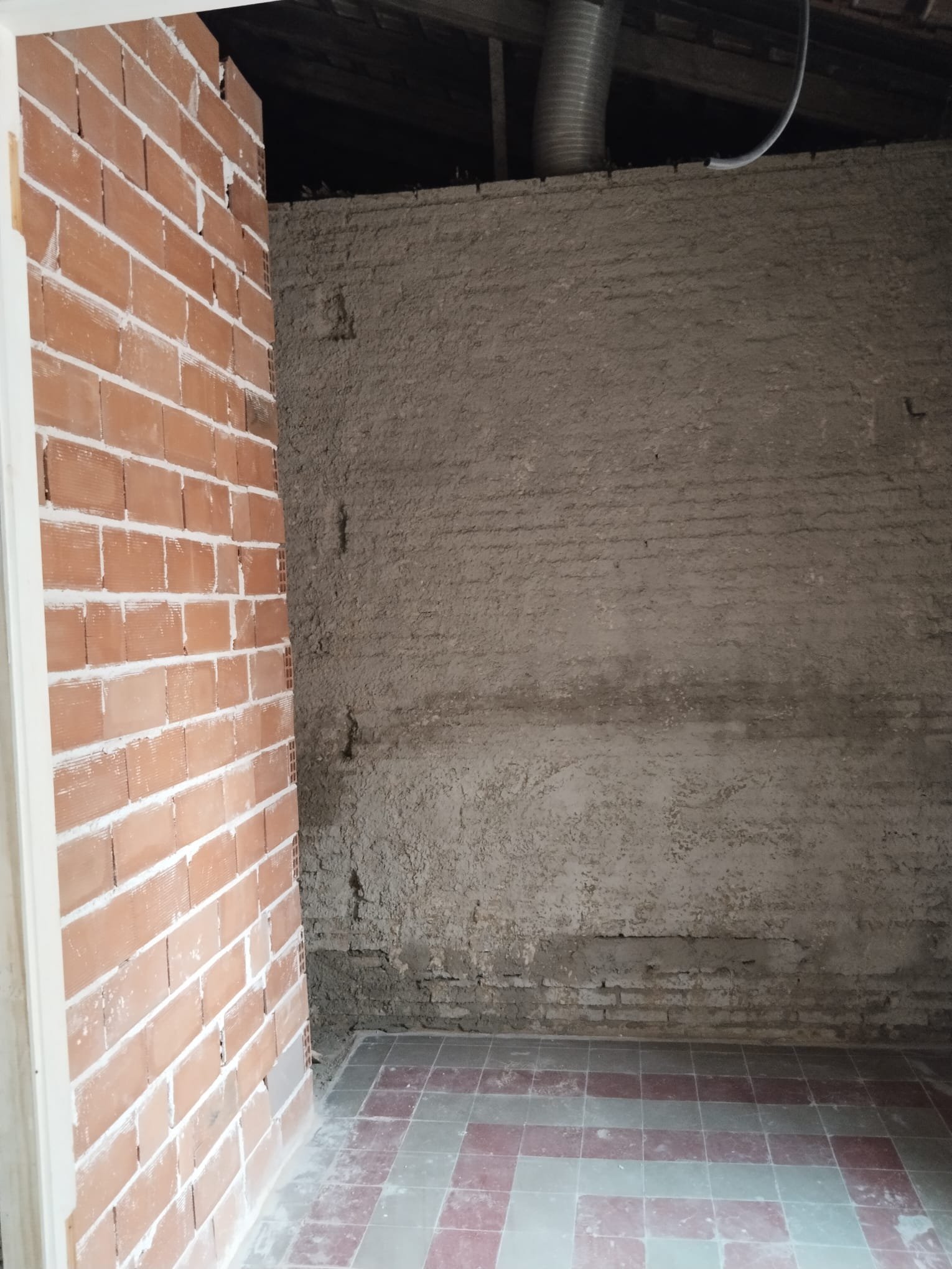 Rehabilitación interior completa de vivienda con redistribución de espacios